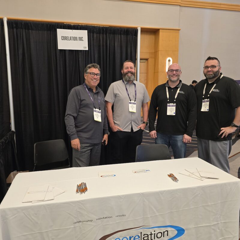 Corelation team and credit union attendees at the Corelation booth during the Operations and Technology Councils' Conference